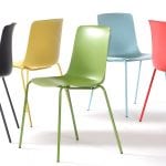 Chairs made at NCP in five different colors: black, yellow, green, blue and red.