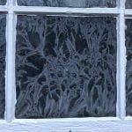 Ice formations on a window, turning the window into a piece of beautiful temporary art.