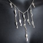 One of goldsmith, Merete’s silver necklaces, in the shape of beautiful designer fish.