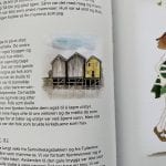 A book page with a text about Lapphella and illustrations of boathouses.