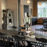 Interior at the old school house at Valla, black wooden furniture,cozy atmosphere